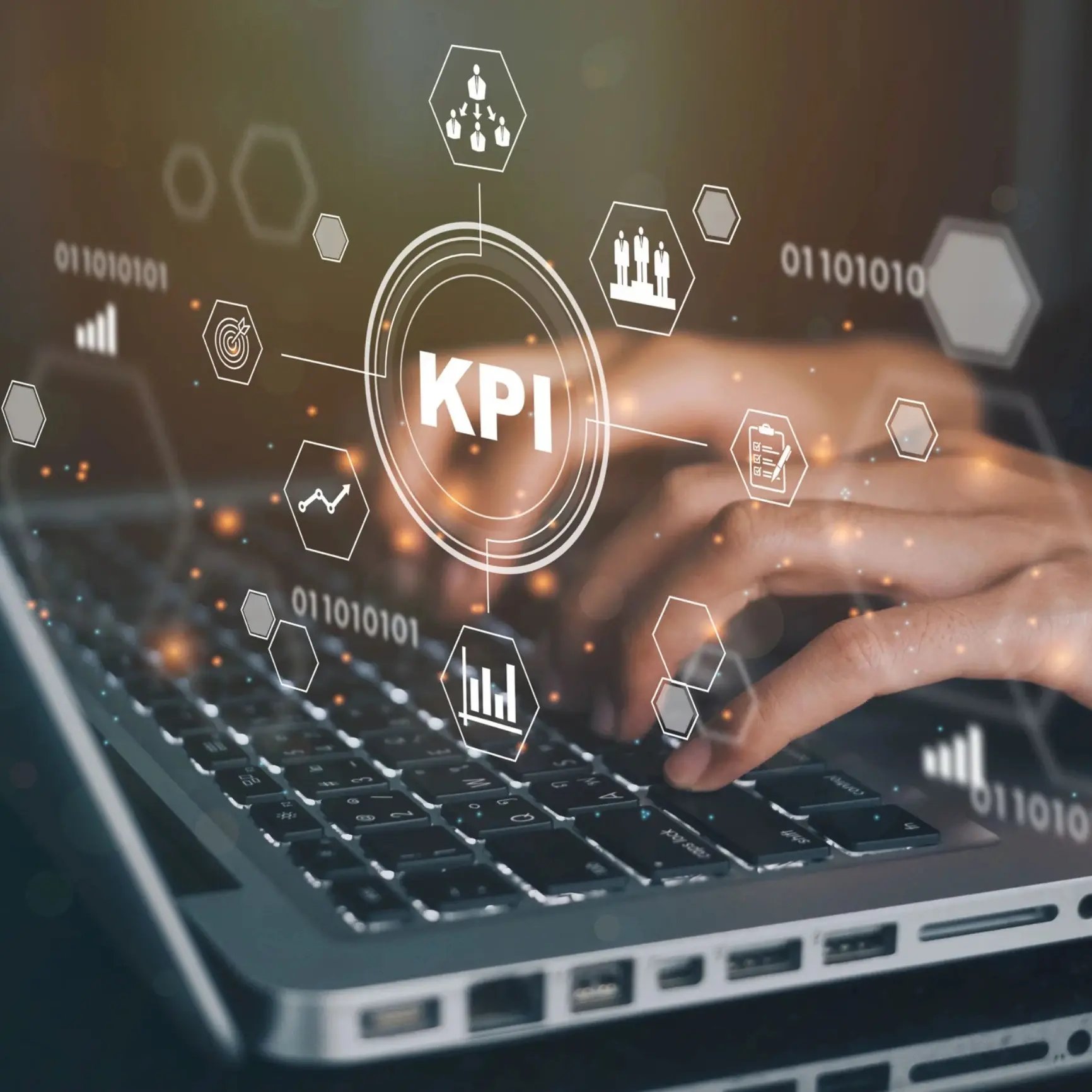 hands typing on keyboward with kpi and related icons superimposed over
