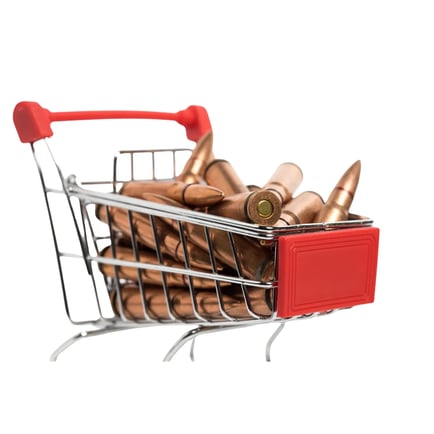 Shopping cart filled with ammunition, symbolizing Firearms eCommerce and online purchasing of tactical or ammunition products.