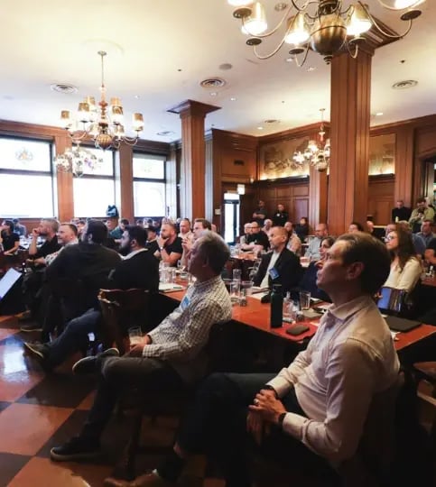 Attendees listening to a presentation at Shopware Partner Day North America event