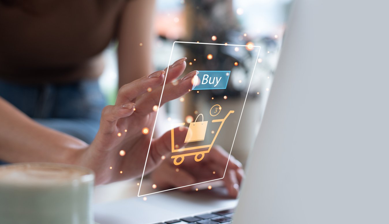 woman pressing on a buy button
