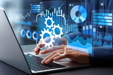 data on computer screen man typing