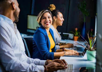 women working at eCommerce web design agency